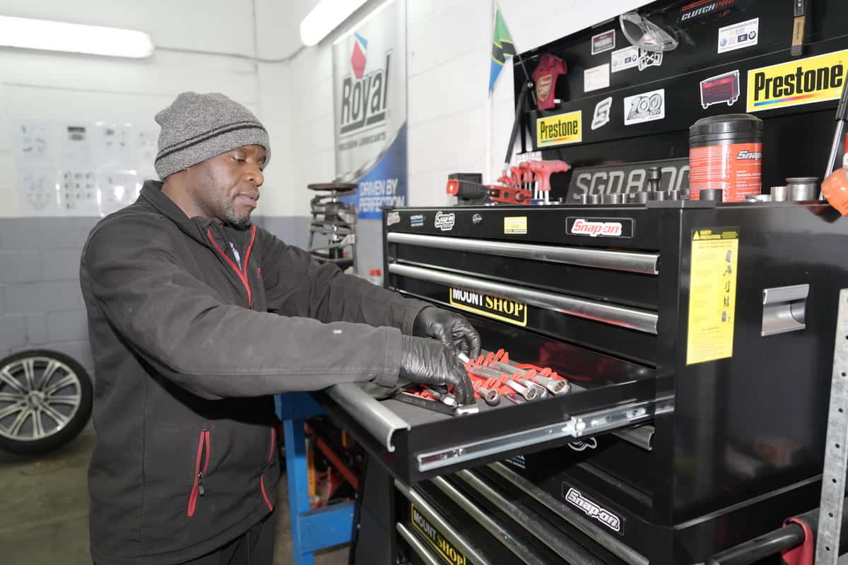 Owner Busy In Checking Car parts